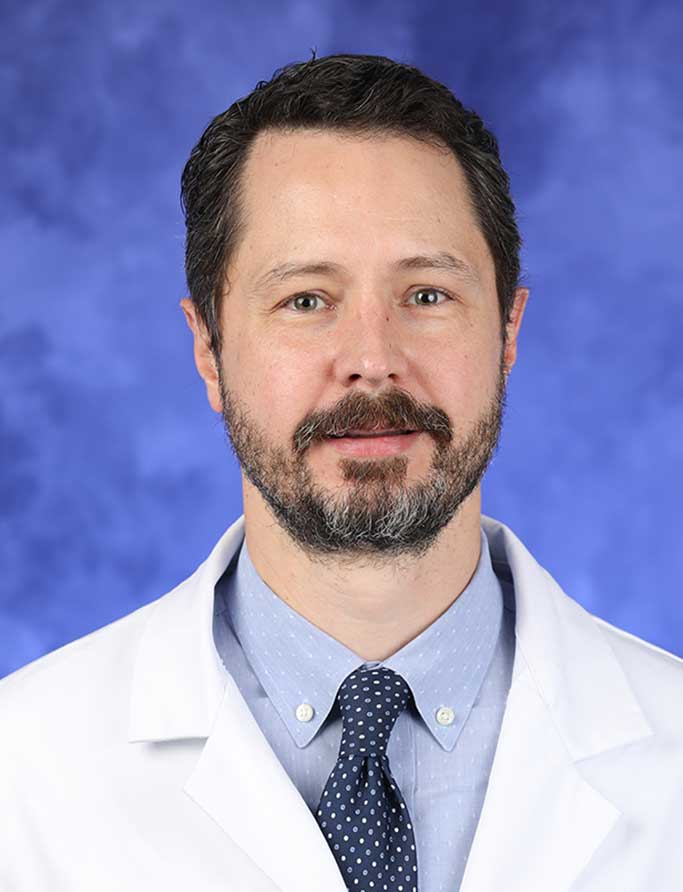 Bryan J. Traughber, MD Bryan J. Traughber, MD