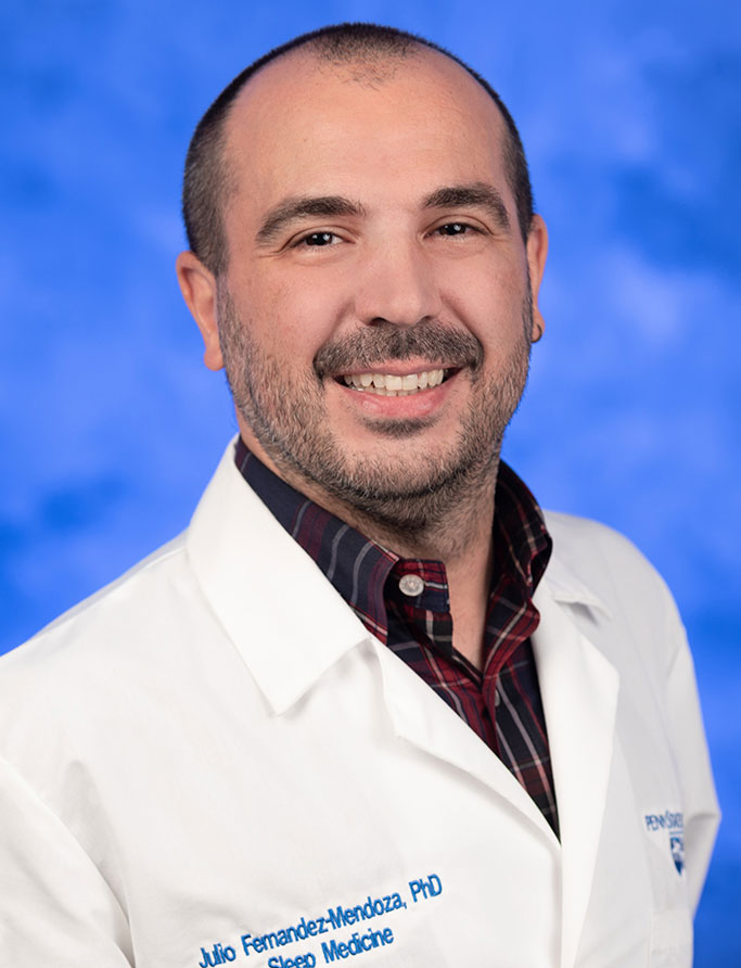 A head-and-shoulders professional photo of Dr. Julio Fernandez-Mendoza