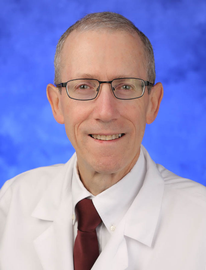 A head-and-shoulders portrait of Zachary Simmons, MD